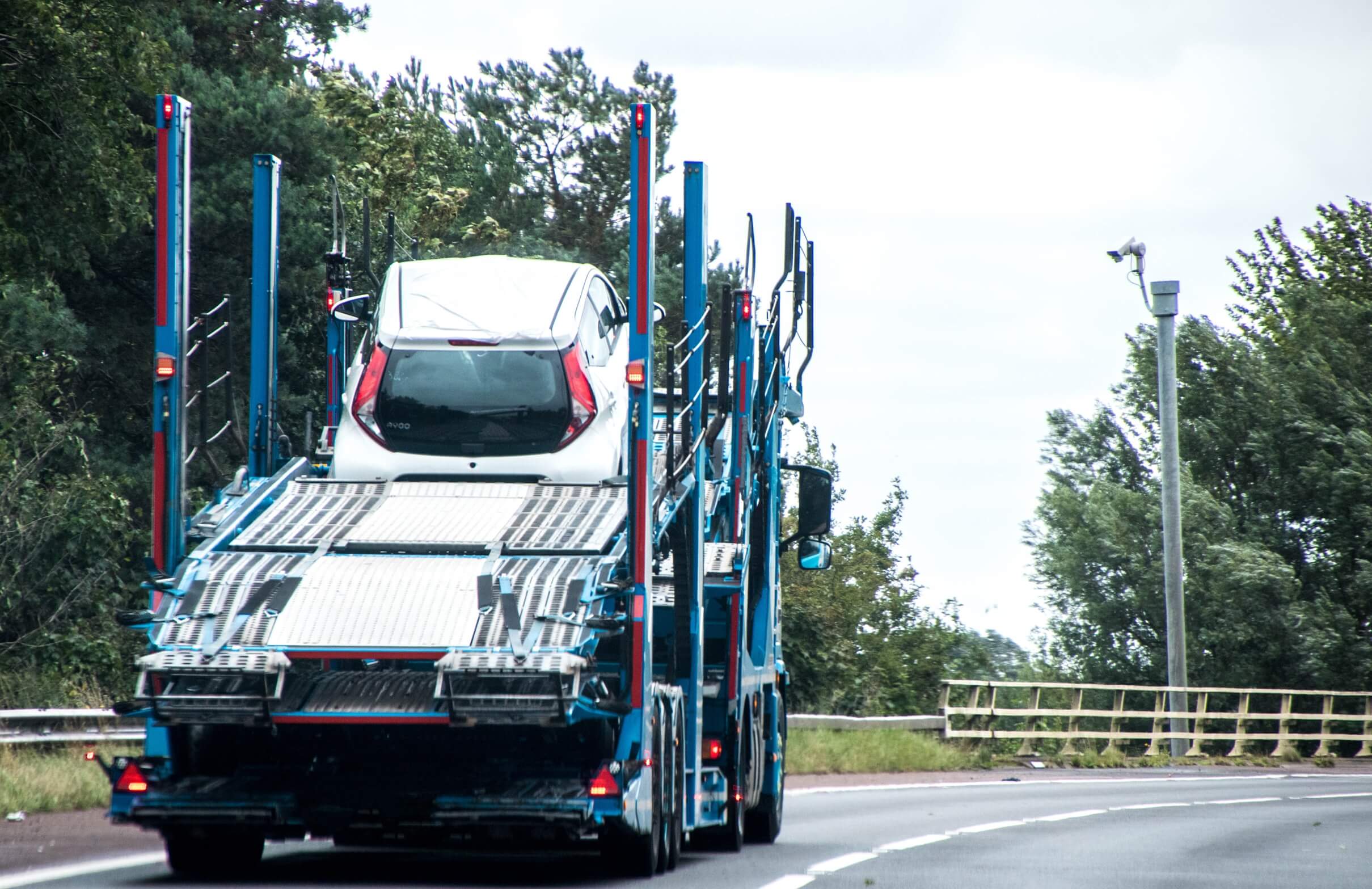 A car transporter truck with an official ATF logo.